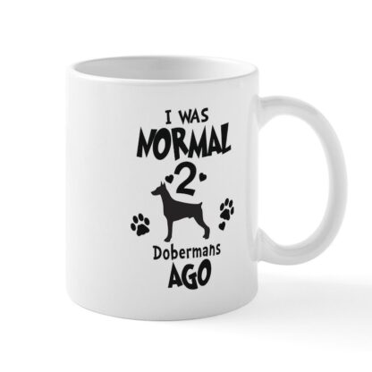 I WAS NORMAL 2 DOBERMANS AGO 11 oz Ceramic Mug